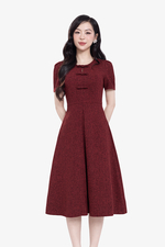 Đầm đỏ dáng xòe xếp ly đính nơ