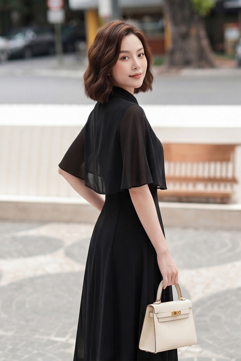 Đầm xòe màu đen đính kèm áo khoác mỏng