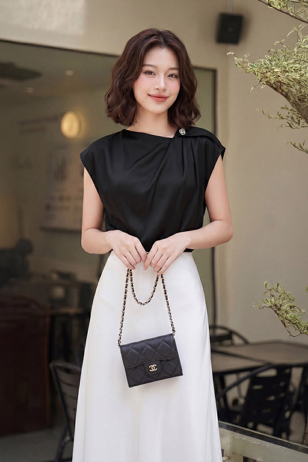 Áo kiểu công sở màu đen sát nách